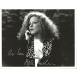 Bette Midler signed 10x8 inch black and white photo. Good condition. All autographs come with a