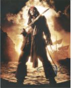 Johnny Depp signed 10x8 inch Pirates of the Caribbean colour photo. Good condition. All autographs