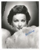 Gene Tierney signed 10x8 inch black and white vintage photo. Good condition. All autographs come