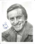 Kirk Douglas signed 10x8 inch black and white vintage photo. Good condition. All autographs come