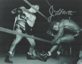 Jake LaMotta signed 10x8 inch black and white photo. Good condition. All autographs come with a