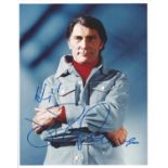 Jack Palance signed 10x8 inch vintage colour photo. Good condition. All autographs come with a