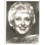 Celeste Holm signed 10x8 inch black and white photo. Good condition. All autographs come with a