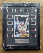 Sylvester Stallone signed colour photo. Mounted and framed with Rocky name plaque and 12 movie