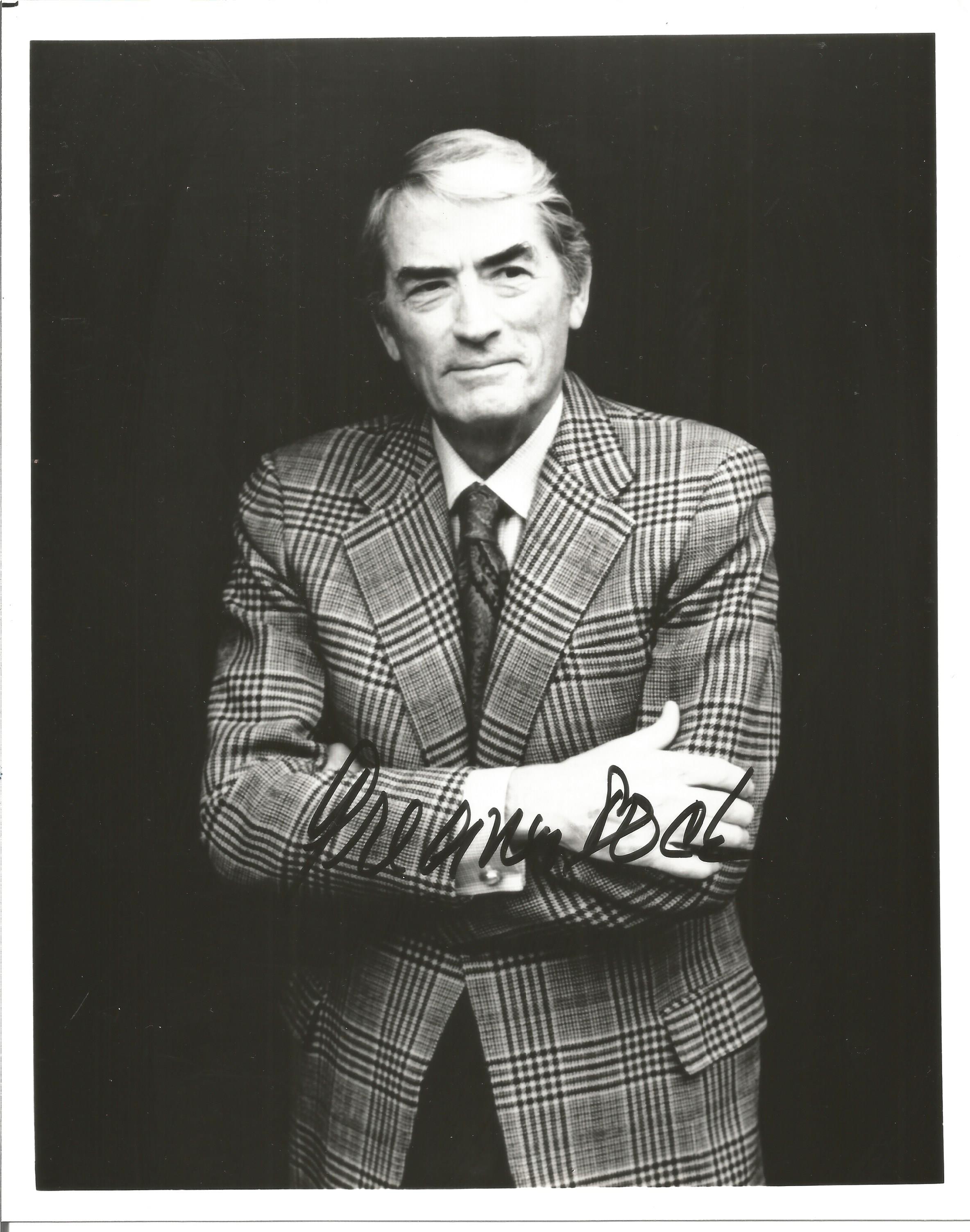 Gregory Peck signed 10x8 inch black and white photo. Good condition. All autographs come with a