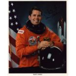 David C Leestma signed 10x8inch official NASA spacesuit photo. Dedicated. Good condition. All