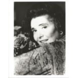 Patricia Neal signed 10x8 inch black and white photo. Good condition. All autographs come with a