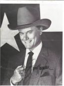 Larry Hagman signed 10x8 inch black and white photo. Good condition. All autographs come with a