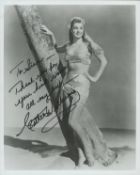 Esther Williams signed 10x8 inch black and white photo dedicated. Good condition. All autographs