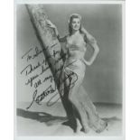 Esther Williams signed 10x8 inch black and white photo dedicated. Good condition. All autographs