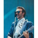 MIDGE URE signed Band Aid 8x12 Photo. Good Condition. All autographs come with a Certificate of