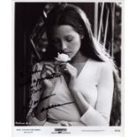 Barbara Carrera signed 10x8 inch black and white photo. DEDICATED. Good Condition. All autographs