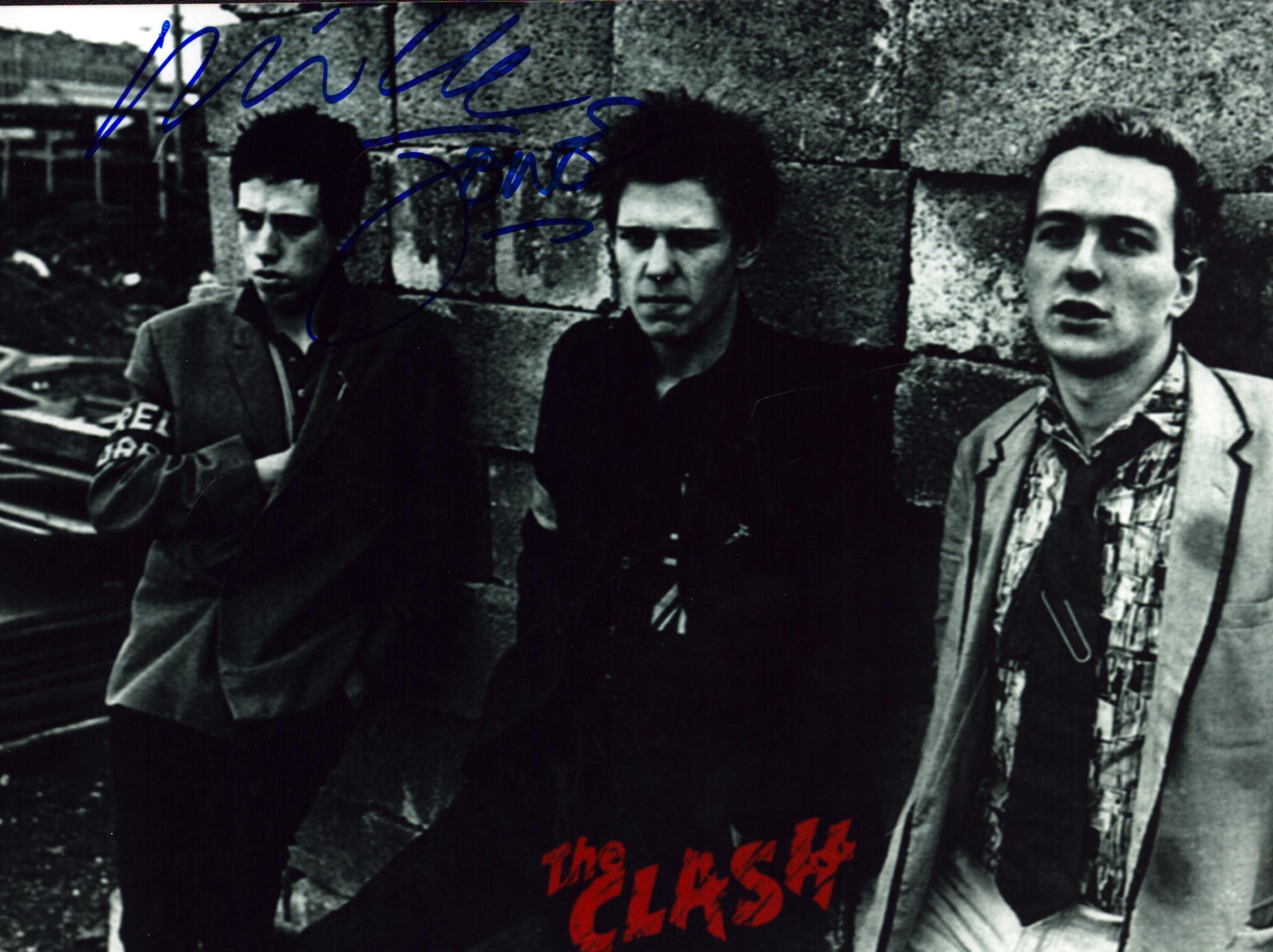 Mick Jones signed 'The Clash' black and white 8x6 inch photo. Good Condition. All autographs come