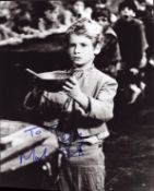 Mark Lester signed 10x8 inch black and white 'Oliver!' photo. DEDICATED. Good Condition. All