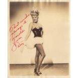 Betty Grable signed 10x8inch sepia photo. Dedicated. Slight water damage to top edge of photo but