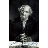 Ron Moody signed black & white photo 5.5x3.5 Inch. Dedicated. Was an English actor, composer, singer