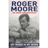 Roger Moore signed My World Is My Bond The Autobiography paperback book. Good Condition. All