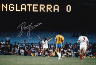 Football Autographed JOHN BARNES 12 x 8 Photo : Col, depicting England's JOHN BARNES celebrating