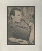 Jimmy Greaves signed 15x12 inch overall mounted black and white magazine photo. All autographs