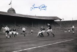 Football Autographed LAWRIE REILLY 12 x 8 Photo : B/W, depicting a wonderful image showing LAWRIE