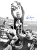 Football Autographed RONNIE BOYCE 16 x 12 Photo : B/W, depicting West Ham United captain Bobby Moore