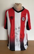 Brentford Football club multi signed football shirt signed by current squad members and others.