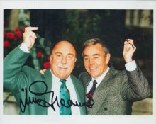 Jimmy Greaves signed 12x8 inch black and white photo pictured with his TV partner Ian St John. All