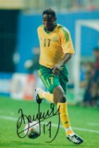 Football Benni McCarthy signed 12x8 inch colour photo pictured in action for South Africa. All