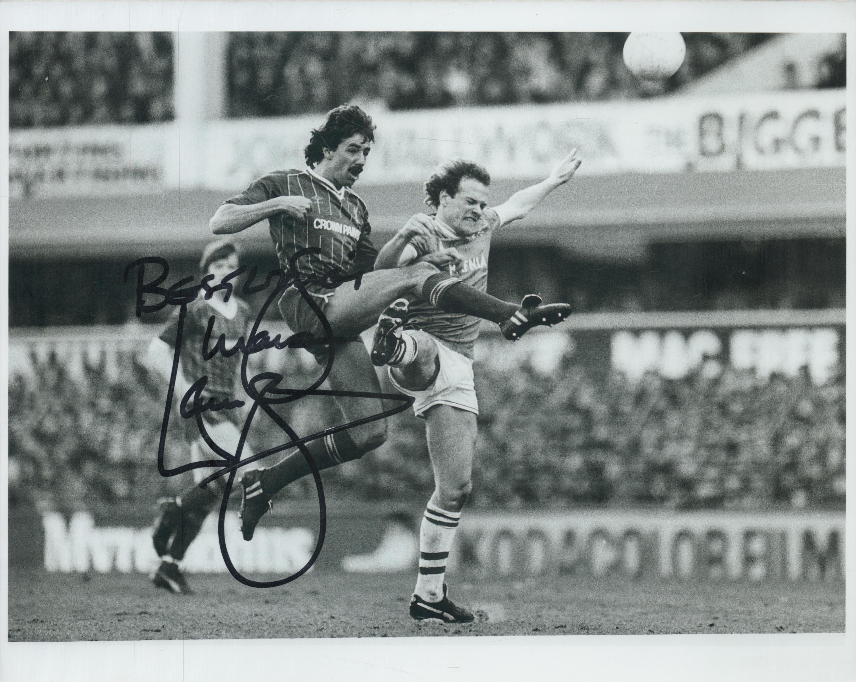 Mark Lawrenson signed 10x8 inch black and white photo pictured in action for Liverpool. All