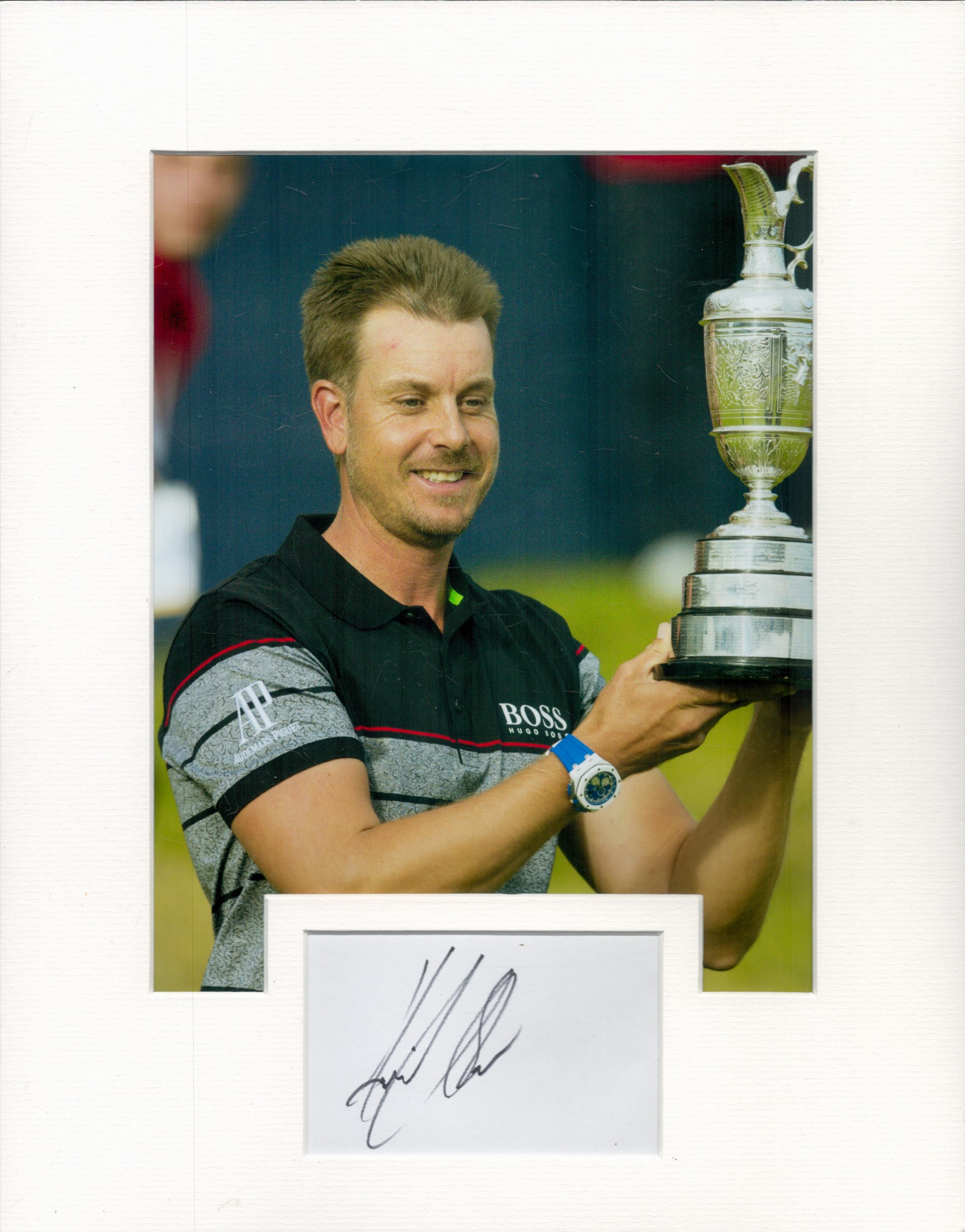 Henrik Stenson 14x11 inch mounted signature piece includes signed album page and colour photo