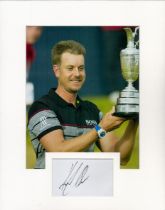 Henrik Stenson 14x11 inch mounted signature piece includes signed album page and colour photo