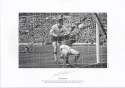 Football. Nat Lofthouse Signed 11x8 black and white photo set on A3 card. Photo shows Lofthouse