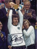 Football Autographed PAUL BREITNER 8 x 6 Photo : Col, depicting West Germany's PAUL BREITNER holding