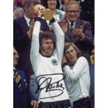 Football Autographed PAUL BREITNER 8 x 6 Photo : Col, depicting West Germany's PAUL BREITNER holding