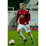 Football Donny van de Beek signed 12x8 inch colour photo pictured in action for Manchester United.