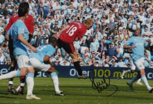 Football Autographed PAUL SCHOLES 12 x 8 Photo : Col, depicting Man United's PAUL SCHOLES heading