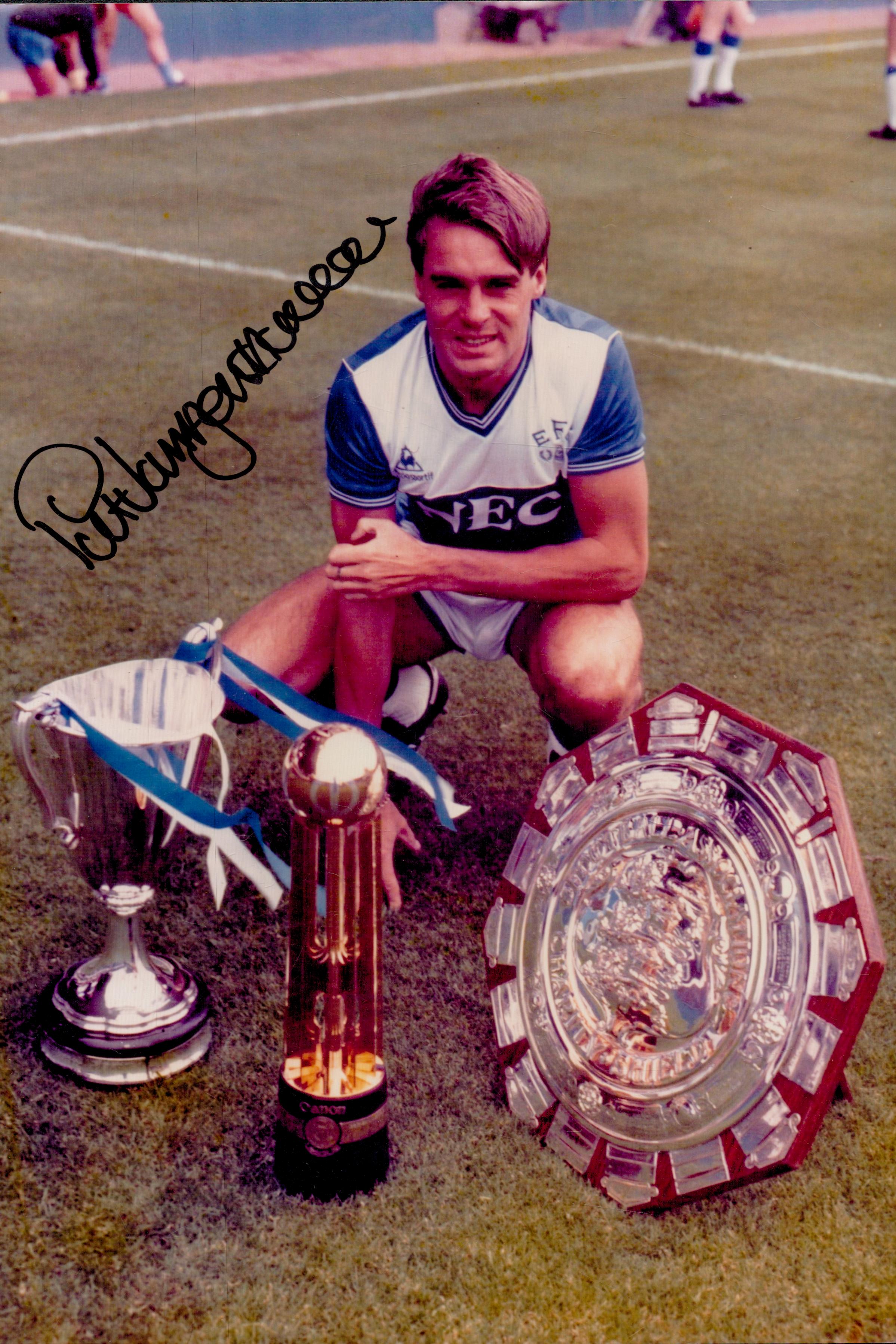 Pat Van Den Hauwe signed 12x8 inch colour photo pictured during his days with Everton. All