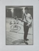 Paul McCartney signed and mounted black and white photo 13x10 inch approx. DEDICATED. Good