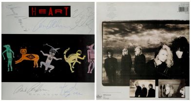 Heart signed Bad Animals 33rpm record sleeve. Signed by Ann Wilson, Nancy Wilson, Howard Leese, Mark