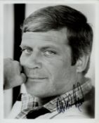 Oliver Reed signed 10x8 inch black and white photo. Good Condition. All autographs come with a