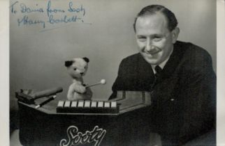 Harry Corbett signed 6x4inch black and white photo with Sooty. Dedicated. Good Condition. All