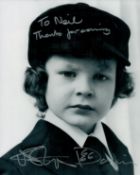 Harvey Stephens signed 10x8inch black and white photo as Damien in The Omen. Dedicated. Good