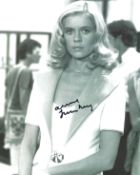 Ann Lonnberg signed 10x8 inch James Bond Moonraker black and white photo. Good Condition. All