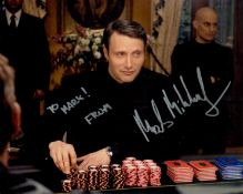 Mads Mikkelsen signed 10x8 inch Casino Royale colour photo dedicated. Good Condition. All autographs