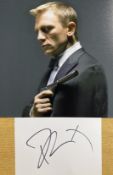 Daniel Craig signed 6x4 inch white card and 10x8 inch James Bond Colour photo. Good Condition. All