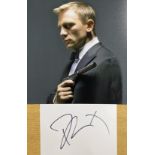 Daniel Craig signed 6x4 inch white card and 10x8 inch James Bond Colour photo. Good Condition. All