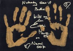 007 Bond movie actress Caroline Munro's actual personal double hand print, in gold acrylic paint