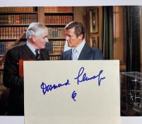 Desmond Llewelyn signed 6x4 inch white card and 10x8 inch James colour photo. Good Condition. All