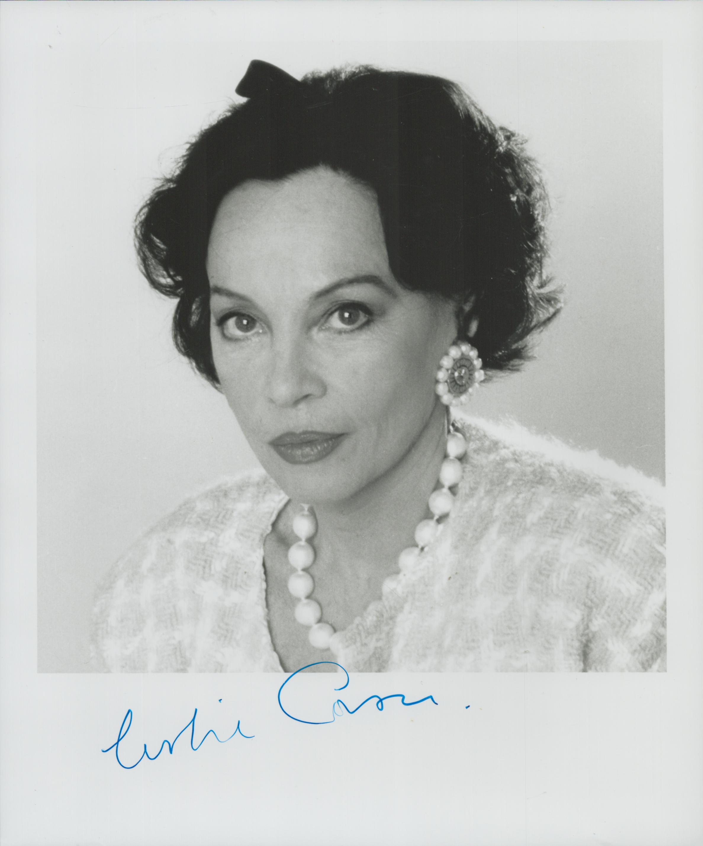 Leslie Caron signed 10x8 inch black and white photo. Good Condition Est