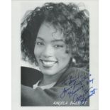 Angela Bassett signed 10x8 inch black and white promo photo dedicated. Good Condition Est